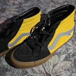 Vans Black and Yellow High-Top Sneakers